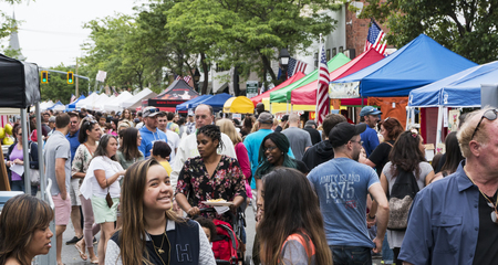Bay Shore, NY, USA - 10 June 2018: The Hamlet of Bay shore on Long Island streets are crowded with vendors and people during their annual community street fair.のeditorial素材