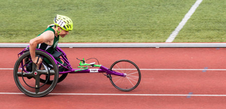 Middletown, New York, USA - 7 June 2019: A High school track and field wheelchair athlete competing...