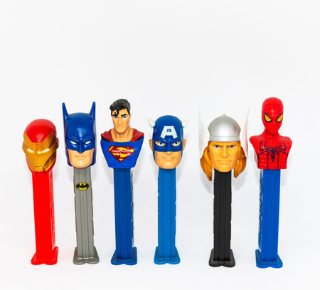 West Islip, New York, USA - 5 February 2021: A collection of Pez despenser superhero charecters from...
