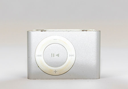 Babylon, New Yok, USA - 20 February 2020: Close up of a silver mini portable music player with a...