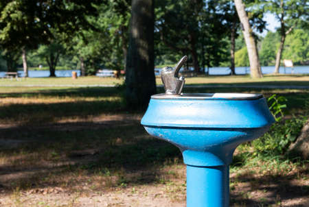 Top of a blue water fountain in Belmont Lake State Park Long Island New York.の写真素材