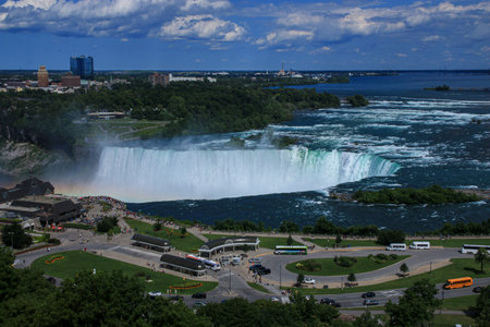 Niagara Falls, Onterio, Canada - 30 July 2023: View from above in my hotel room of horseshoe falls and the new tork skyline.のeditorial素材