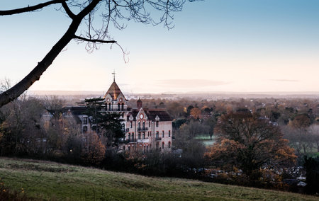 Majestic building in the middle of a cold wintery day in London with a grass park in the foregroundの写真素材