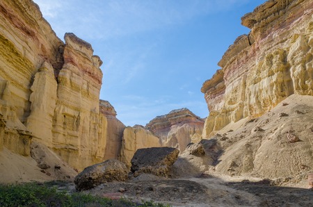 Impressive natural canyon in the Namibe Desert of Angola. The sandstone has been eroded over thousands of years into its current shapes.の写真素材