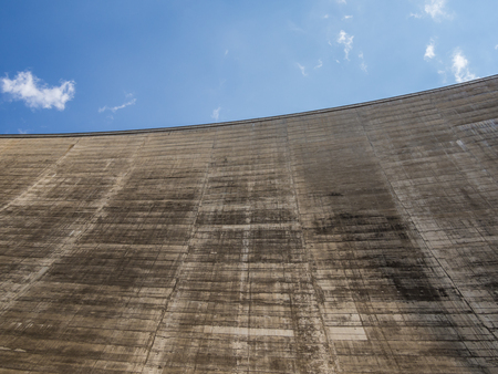 Impressive concrete wall of Katse Dam hydroelectric power plant in Lesotho, Africaの写真素材