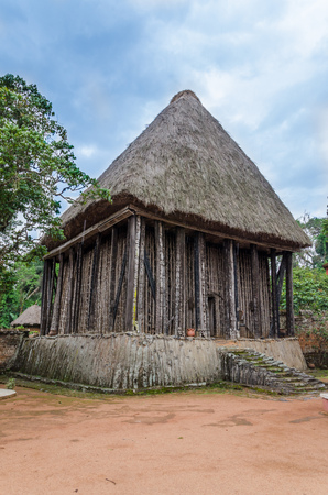 Wood and bamboo temple called Achum at traditional Fons palace in Bafut, Cameroon, Africaの写真素材