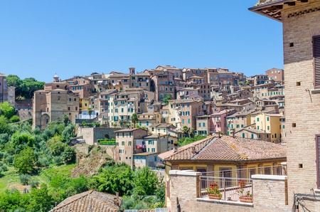 View over typical historic Italian houses in Unesco World Heritage town Siena, Italy, Europeの写真素材