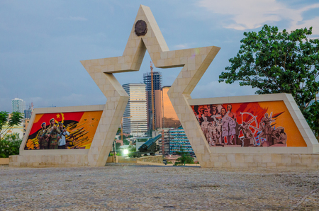 LUANDA, ANGOLA - APRIL 28 2014: Civil war memorial depicting Angolan flag and soldiers at Fortaleza de Sao Miguelのeditorial素材