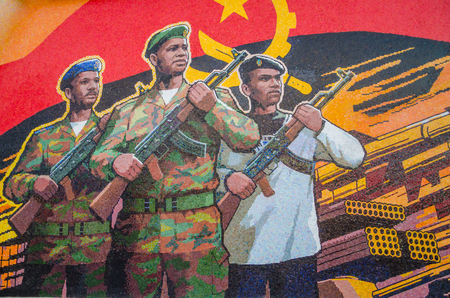 LUANDA, ANGOLA - APRIL 28 2014: Civil war memorial depicting Angolan flag and soldiers at Fortaleza de Sao Miguelのeditorial素材