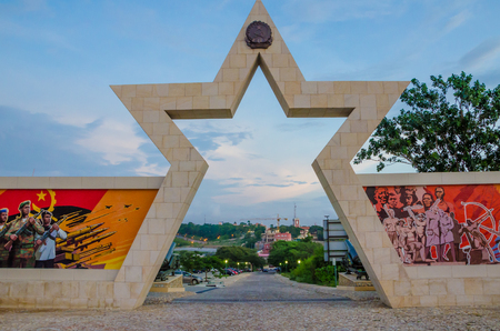 LUANDA, ANGOLA - APRIL 28 2014: Civil war memorial depicting Angolan flag and soldiers at Fortaleza de Sao Miguelのeditorial素材