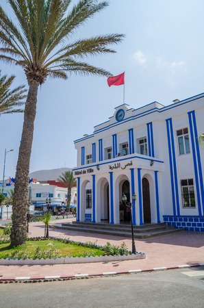 Sidi Ifni, Morocco - September 20 2013: Beautiful blue and white washed Hotel de Ville at roundabout in town centerのeditorial素材