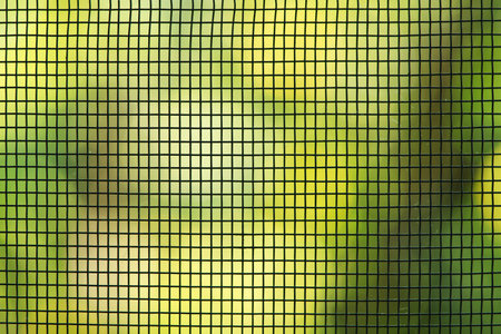 Abstract of wire screen pattern on the window