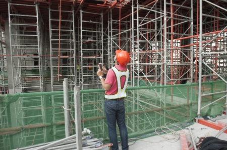 an engineer checking sitee workの写真素材