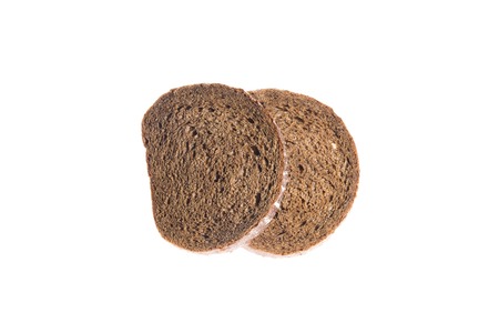 Slice of fresh rye bread isolated on white backgroundの写真素材
