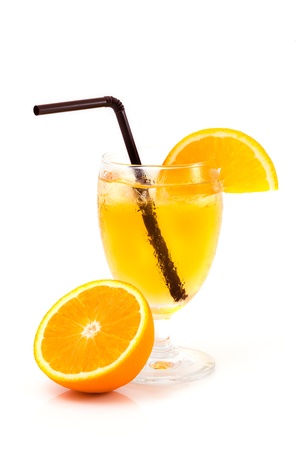 A glass of orange juice with white isolated background の写真素材
