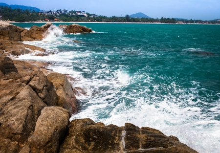 Strong wave attack the rocks in Samui island, Thailandの写真素材