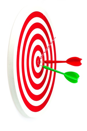 Isolated of the darts hit target on the white backgroundの写真素材