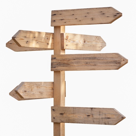 Blank wooden direction sign against white backgroundの写真素材