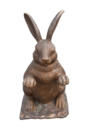 Copper rabbit statue isolated on white backgroundの写真素材