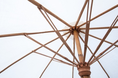 White bamboo umbrella under sunlightの写真素材