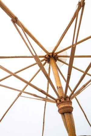 White bamboo umbrella under sunlightの写真素材