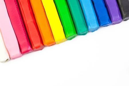 Line of colorful clay on white backgroundの写真素材