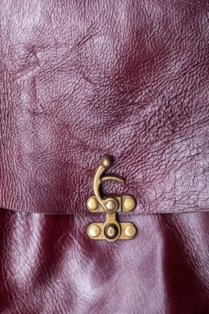 Close up of brown leather texture white brass lockの写真素材