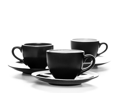 Pile of coffee cups on white backgroundの写真素材