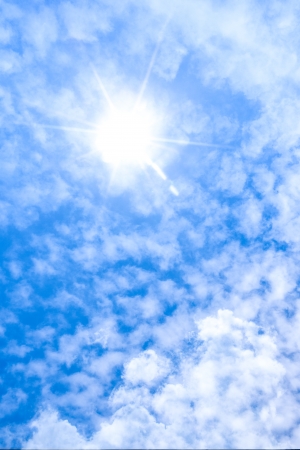 Sun ray in white cloud and blue skyの写真素材