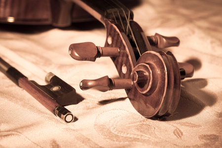 Vintage violin and bow in still life concept