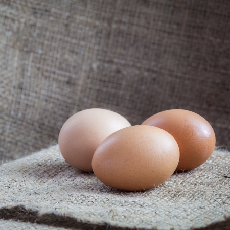 Eggs lay on sackcloth, selected focusの写真素材
