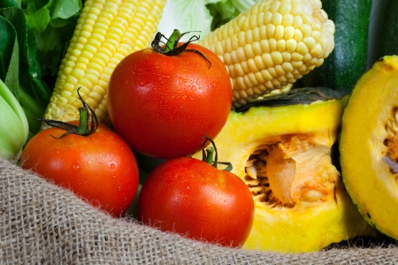 fresh vegetables on the sack clothの写真素材