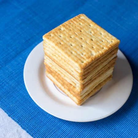 Tasty biscuits on white plateの写真素材