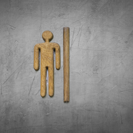 Restroom sign made of teak wood on concrete wallの写真素材