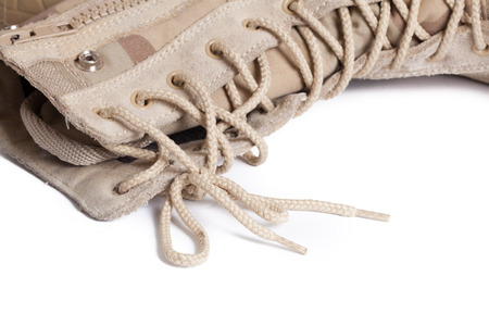 Combat boots on isolated white backgroundの写真素材