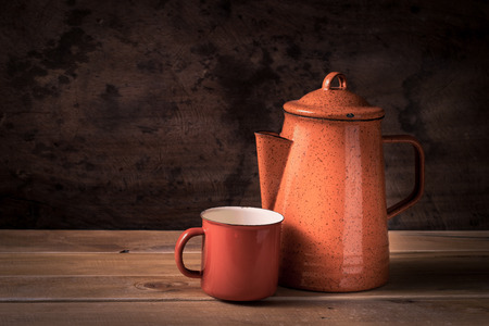 Still life teapot and teacup on wooden deskの写真素材