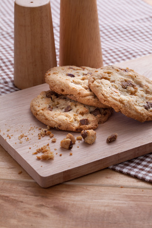 Stack of soft cookies on wooden plateの写真素材