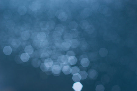 Hexagon boken on water surfaceの写真素材