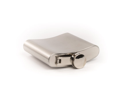 Stainless hip flask on isolated white backgroundの写真素材
