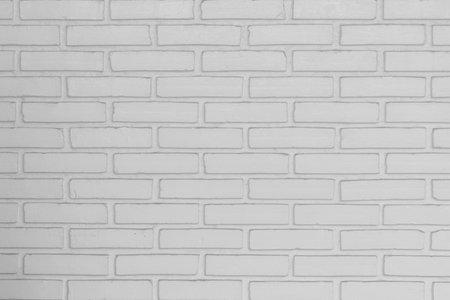 Old white brick wall background and texture