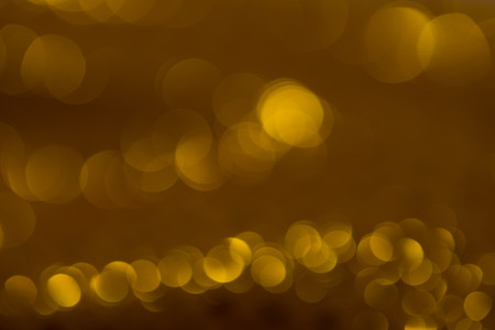 abstract background with bokeh defocused lights and shadowの写真素材