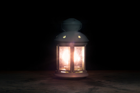 White lantern light on wooden background with copyspaceの写真素材