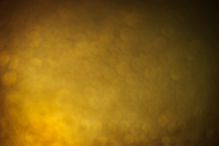 abstract background with bokeh defocused lights and shadowの写真素材