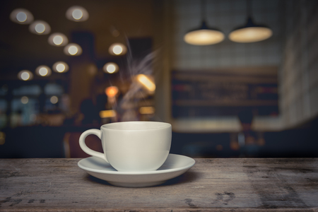 cup of coffee on table in cafeの写真素材