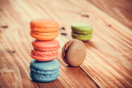 Colourful tasty macaroons in a rowの写真素材