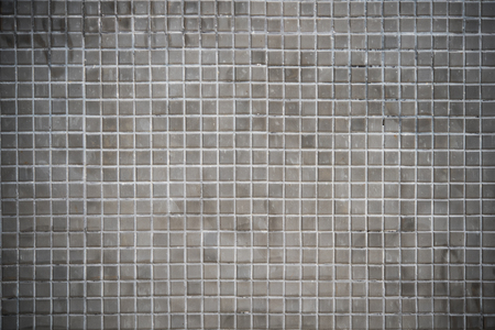 dirty grunge mosaic tiles abstract background and textureの写真素材