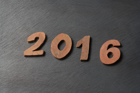 clay letter number 2016 on cork board, happy new year effect in vintage styleの写真素材