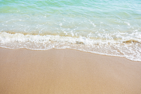 wave on clear sand beach with copyspaceの写真素材