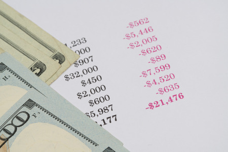 The dollar banknotes with expense bill for business and finance conceptの写真素材