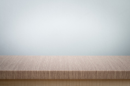 gray wall background  and free space for you and desk spaceの写真素材